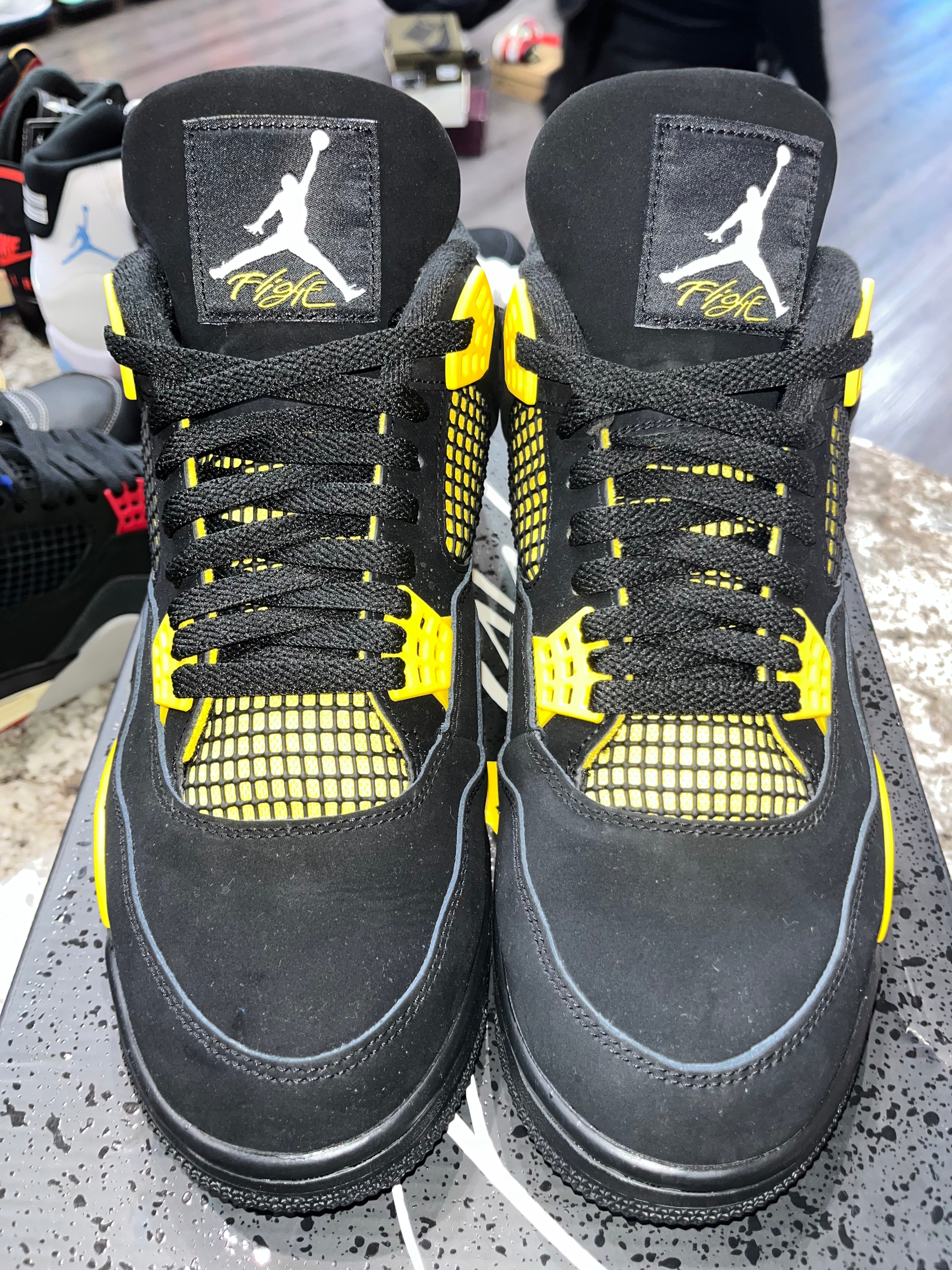 Jordan 4 Retro Thunder (2023)